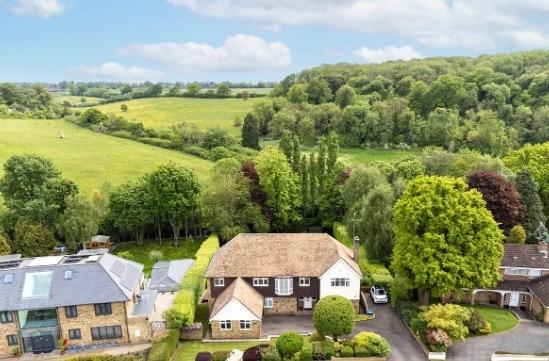 An aerial shot of the property which highlights the sought-after countryside surroundings.