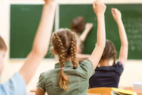 School children in classroom at lesson (stock image).