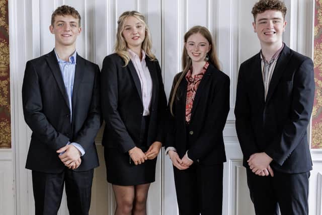 Tom, Bo, Darcey-Summer and Elliot, Year 13 graduating pupils
