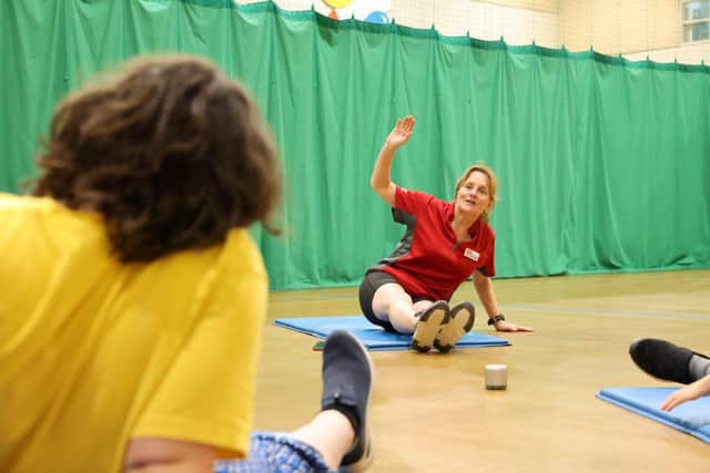 Sally Clements, Love to Move instructor and gymnastics coach, leading a session
