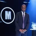 Host Clive Myrie with Mastermind glass bowl