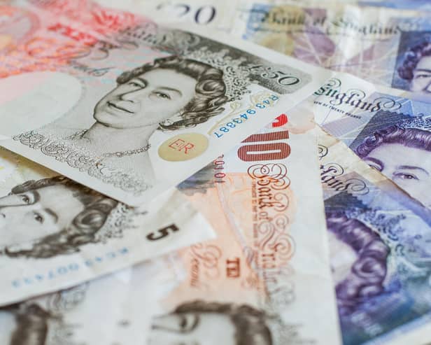 File photo of a pile of bank notes.