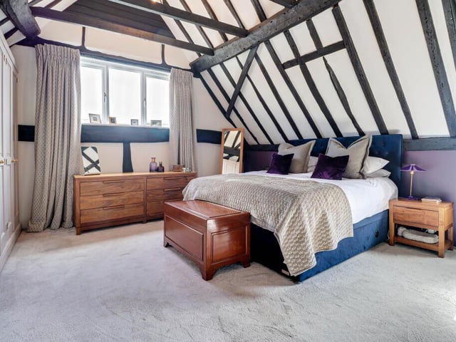 This is the largest of the house's four bedrooms - ample space for family and guests to stay over. This room was once the hay loft, but now has an amazing vaulted ceiling and extensive fitted wardrobes.