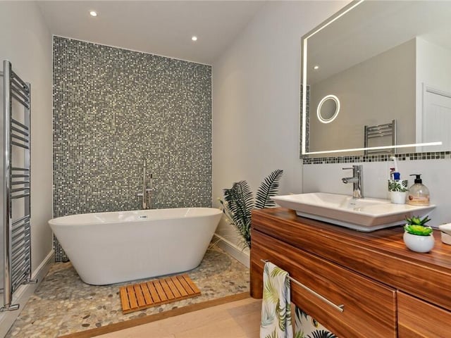 While this may just be an en suite, there are three more bedrooms that have en suites, with a separate bathroom for the guest rooms.
