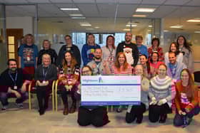 Hightown staff will hand over £5,345 to the Trussell Trust in time for Christmas