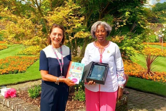 Osborne, sponsored the School Awards handing to Yvonne Davis