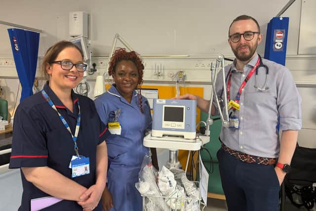 Adam Rochester (right) with members of the pressure ulcer improvement team