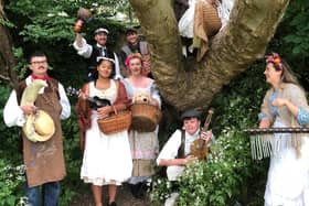 Cast members prepare for A Midsummer Night's Dream.