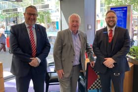 Sir Mike Penning MP, centre, pictured with Guy Jones-Owen, left, and David Byrne during a visit to the Hemel Hempstead branch of Metro Bank