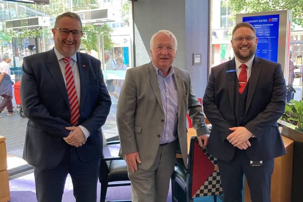 Sir Mike Penning MP, centre, pictured with Guy Jones-Owen, left, and David Byrne during a visit to the Hemel Hempstead branch of Metro Bank