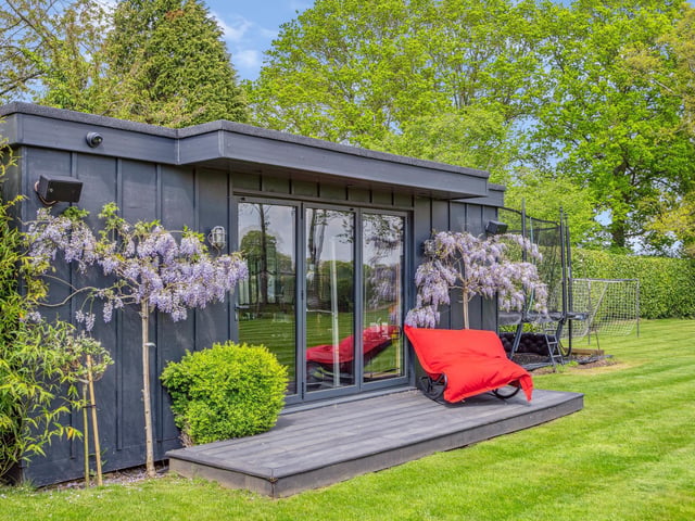 Two substantial outbuildings are currently used as a home gym and recording studio with the property backing on to open fields giving a real sense of rural living.