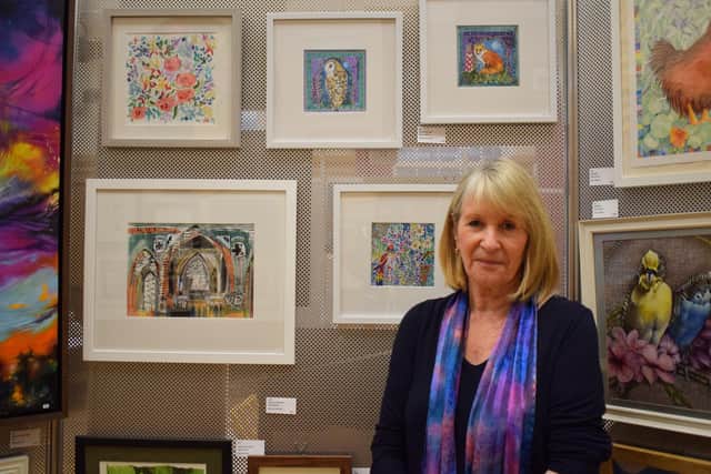 Catherine Archer with her paintings for the Berkhamsted Art Society winter exhibition.