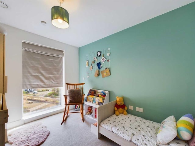 A second spacious bedroom could be fitting for a little one or double as a study.