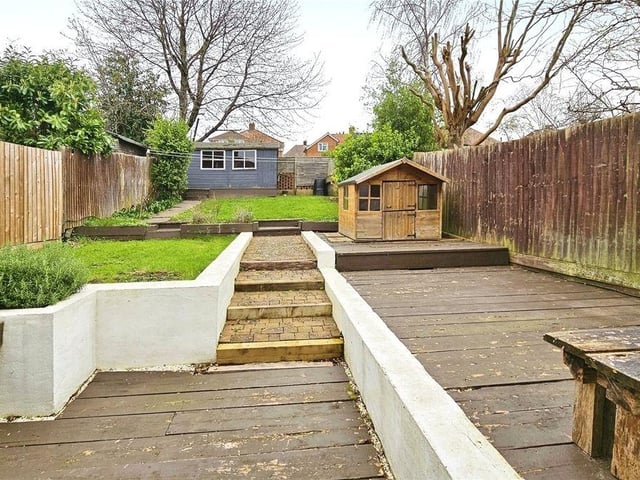 A long, rambling back garden adds to this characterful 1930s home.