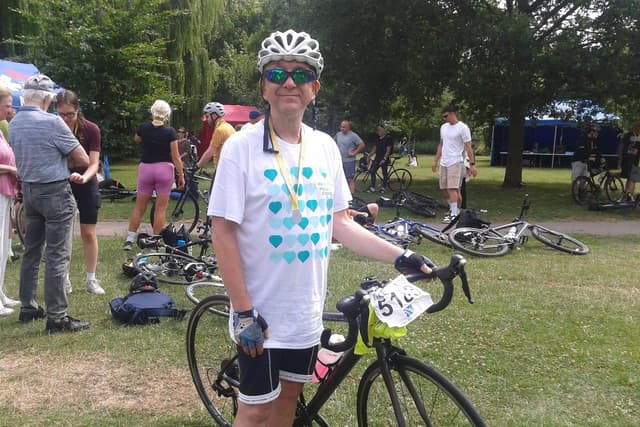 Hospital charity volunteer raises £1,000 with 57-mile bike ride in memory of his father