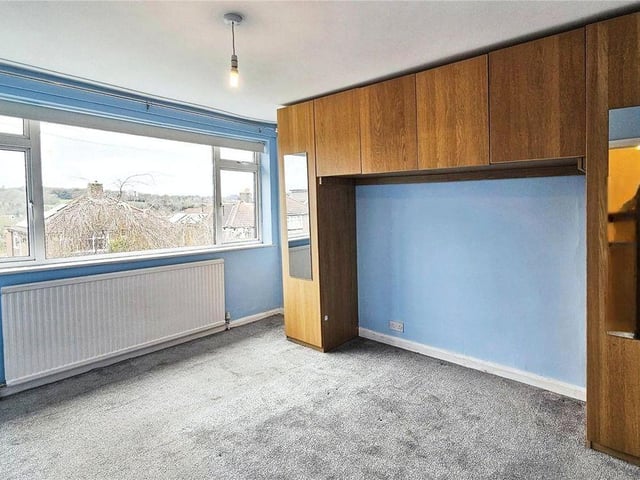 The master bedroom has plenty of storage and fitted wardrobes.