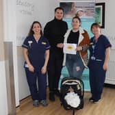 Baby Aris with parents Adrian and Alexandra Blanaru between senior midwives Bianca Baum (left) and Kelly Kinsella (right). Photo: WHTH