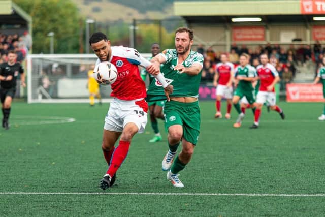 Joe Iaciofano (right) battles for possession at Dorking. Photo: Jemma Sear/HHTFC.