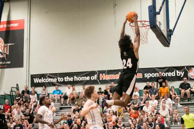 Vernon Eze adds points to the board against USA Select. Photo: Jo Charles.