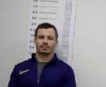 Sean Hopkins is wanted by the police