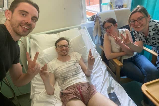 Veronica/Kevin (centre) during diagnosis for MS - with support from family