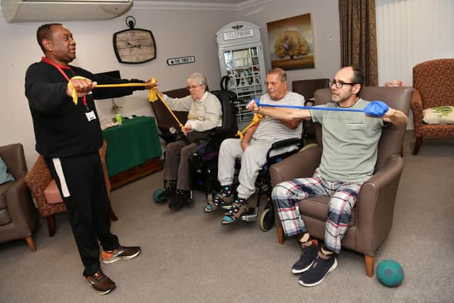 Dinkar and Craig work on their upper body strength