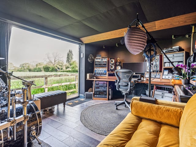 Located within the gardens are two substantial outbuildings currently used as a home gym and music/ recording studio respectively, shown above.