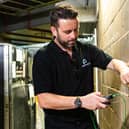 Senior Legionella and Fire Consultant Adam Midson at work