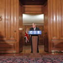 Deputy Chief Medical Officer for England Jonathan Van Tam (left), Prime Minister Boris Johnson (centre) and National Medical Director of NHS England Professor Stephen Powis (right) speaking at a press conference in 10 Downing Street, London, following the tightening of England's Covid-19 tiers.