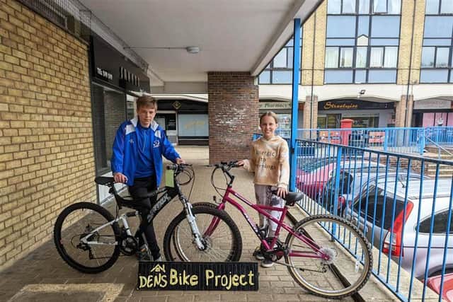 The children with their bikes.