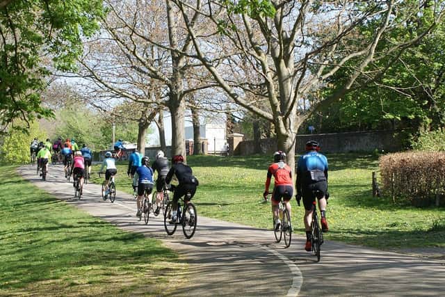 Scores of cyclists came together to ride for charity.