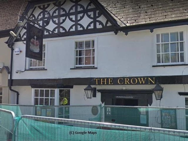 It is said that interference with the barrels comes from the phantom of an old woman, who used to sit in a rocking chair in an alcove and resents intrusion. Temperature drops have been recorded in the cellar, and the ghost is blamed for blocking pipes, making light bulbs "pop" out of their sockets and breaking wine bottles. A second ghost is believed to have moved in to The Crown from nearby pub The Swan (now "The Swan Youth Project") following a 1977 exorcism - that of a man that was buried alive under a cartload of stone. Another phantom is that of an Edwardian man dressed in grey. He has been seen in an upstairs room and has been known to cross the road from near St Peter's Church to the pub.