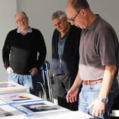Club members prepare for their third photography exhibition
