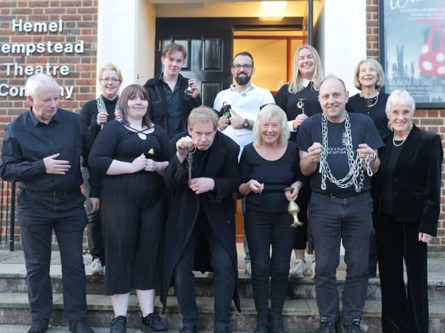 Playwright Tom Watkins (centre back) with the cast of A Christmas Carol