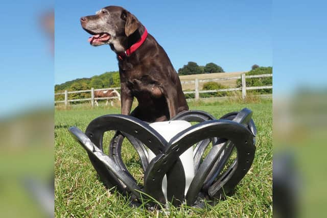 Sophie, pictured with a candle holder