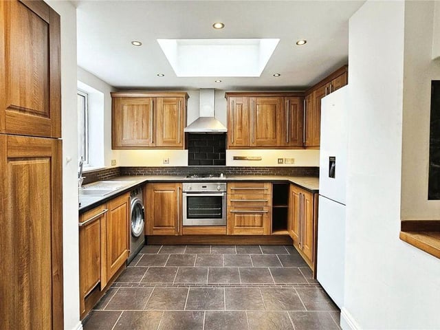 The kitchen includes all modern and essential appliances.