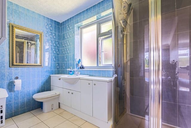 One of two bathrooms in the property, this one is connected to the master bedroom as an en-suite.