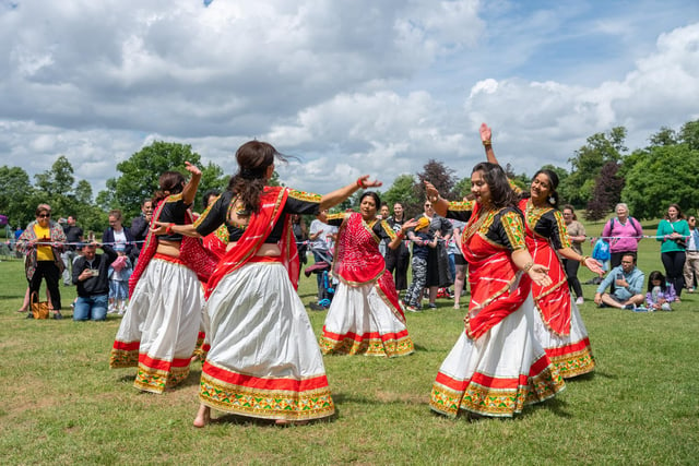 Women from Dacorum Indian Society performed a traditional dance on the field.