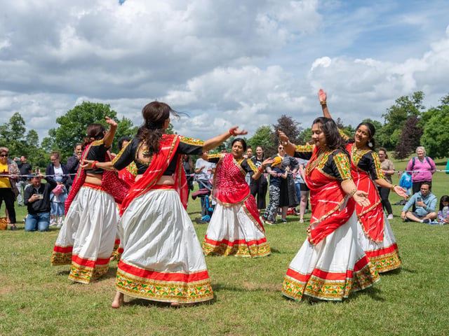 Women from Dacorum Indian Society performed a traditional dance on the field.