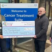 Mary Keenan, Craig Wild and Andy Greenwood from the Three Tuns pub in Apsley present a cheque to Jagdeep Kudhail, head of radiation services, at Mount Vernon Cancer Centre to mark the start of their partnership