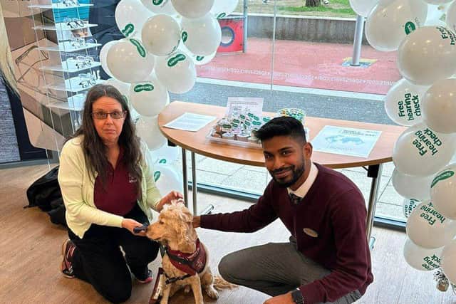 Hearing Dogs Volunteer, Claire Wallace, with Angus & Specsavers Hemel Hempstead Hearing Aid Dispenser Trainee, Anton Rajasooriya.