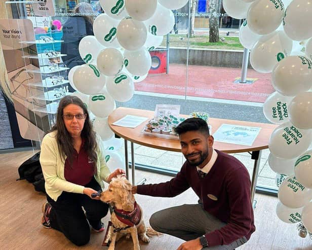 Hearing Dogs Volunteer, Claire Wallace, with Angus & Specsavers Hemel Hempstead Hearing Aid Dispenser Trainee, Anton Rajasooriya.
