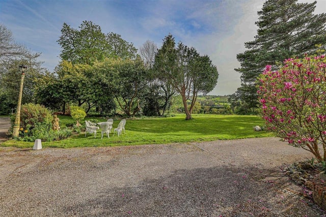 The house is set within 6.6 acres of rolling countryside.