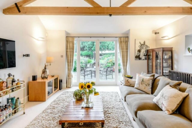 There is plenty of space for a game night in the family room, there are doors leading onto the patio, ready for those summer al fresco evenings