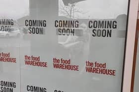 The Food Warehouse signage