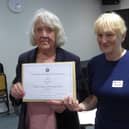 Dawn Pitts being presented with her award by Dr Heather Falvey