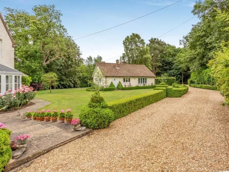 The driveway provides plenty of parking space for residents and guests