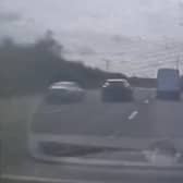 Footage from the dashcam shows the dangerous overtake