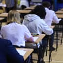High school pupils sitting exam.