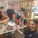 Care UK Knebworth resident Derek Young creating sustainable bird boxes with children from Knebworth Primary & Nursery School for Generations of Change.